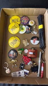 lot 239 image: Lot of Assorted Collectible Pins, Buttons, Keychains, and Accessories