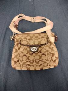 lot 24833 image: Coach Signature Canvas crossbody bag