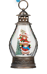 lot 21139 image: Roman Lighted Swirl Highland Cow Mooey Christmas Lantern, 11 H, Confetti Lite, LED Holiday Decoration, USB or Battery Operated - Retail $0