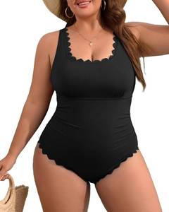 lot 717 image: Charmo Plus Size Bathing Suit for Curvy Women One Piece Ribbed Scalloped Tummy Control Ruched Cut Out Swim Suits 2026 Black 2X - Retail $39
