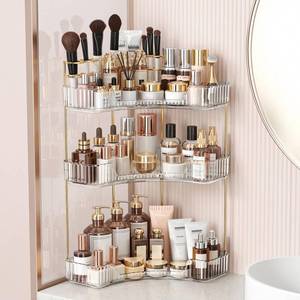 lot 1162 image: BEFSOP Corner Bathroom Counter Organizer, Upgraded 3-Tier Makeup Organizer Countertop with Makeup Brush Holder, Skincare Exquisite Vanity Organizers Countertop Bathroom Storage Dresser(CLEAR) - Retail $27