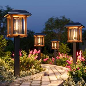 lot 62746 image: XMCOSY 4-Pack Solar Pathway Lights Outdoor, 25 Lumens Vintage Edison LED Landscape Lighting, IP65 Waterproof Seeded Glass & Metal Stakes Solar Powered Garden Lights for Yard Patio Walkway Driveway - Retail $70