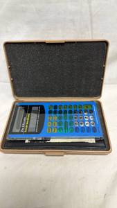 lot 299 image: Stocks Publishing Company Handheld Calculator OVERHEADS Overhead Calculator