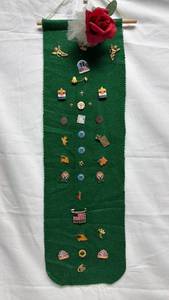 lot 13 image: Pin Collection Wall Hanging Green Felt Banner with Angels Flags and Emblems