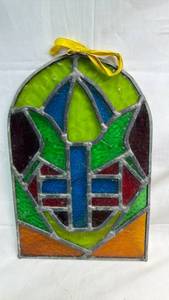 lot 47 image: Stained Glass Panel Ornament with Yellow Ribbon