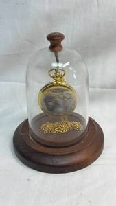 lot 49 image: Pocket Watch with Plastic Dome Display Case and Wooden Base