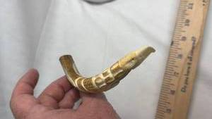 lot 54 image: Carved Antler Pipe w Eagle Relief