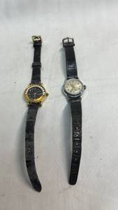 lot 73 image: 2 Piece Lot Quartz Wrist Watches Black Leather Straps