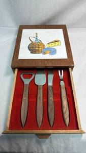 lot 86 image: Cheese Server Set 4-Piece with Wooden Box and Illustrated Lid