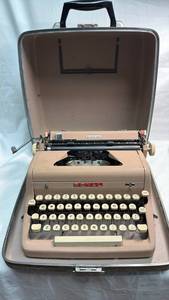 lot 105 image: Royal Quiet De Luxe Portable Typewriter
