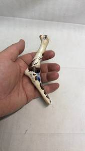 lot 135 image: Hand-Painted Bird Figurine with Decorative Detailing