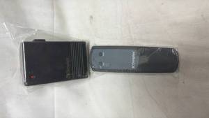 lot 182 image: Dimplex 2-Piece Wireless Remote Control Dimmer Set