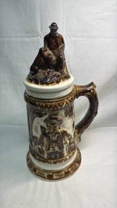 lot 208 image: Decorative Stein with Figural Lid Figure with Dogs