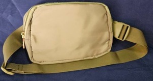lot 125 image: Green Belt Bag with Adjustable Strap and Zippered Compartments