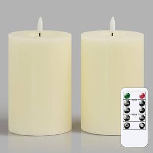 lot 24 image: Zevanor Flameless Flickering 4 x6 Real Wax Ivory Remote Candles with Candle Grease, Pack of 2 Timer LED Battery Operated Fake Warm Light Pillar Candles for Home, Banquet, Ceremony Decoration - Retail $25