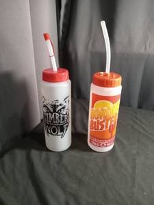 lot 6309 image: 2 Promotional Drink Cups Timber Wolf and Border Buster Taco Bell