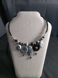 lot 6311 image: Black and White Beaded Charm Necklace with Decorative Pendants