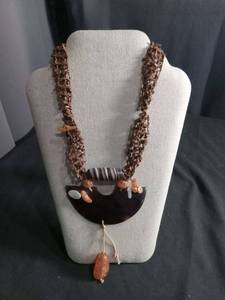 lot 6313 image: Handmade Crochet Necklace with Brown Beads and Crescent Pendant