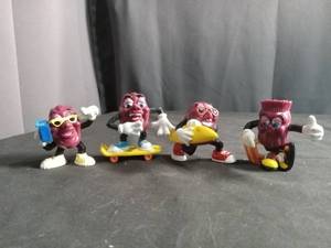 lot 6316 image: 4 Vintage California Raisin Characters Skateboard Accessories