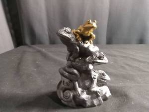 lot 6331 image: Micheal Ricker 3 Frogs on a Lizard figurine