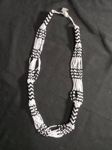 lot 6340 image: Beaded Necklace White Black Striped Pattern Tassel Ends