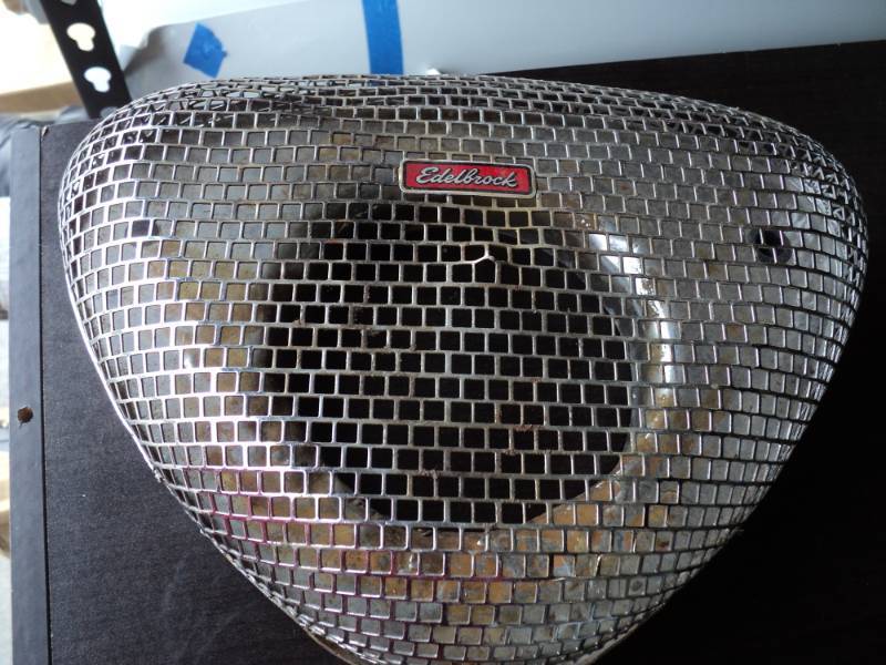 lot 3597 image: Edelbrock Triangle mesh Air Cleaner cover, used