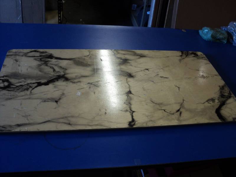 lot 4554 image: Wooden table top, Marble look, 38 x 19, top only no legs or other hardware included