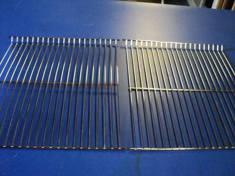 lot 4564 image: (2) ct. lot metal grille grates, 14 x 16, one grate is bent, see photos
