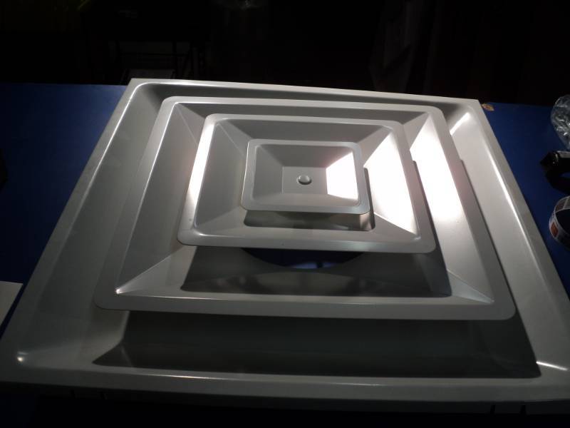 lot 4591 image: US Aire 3- cone step down diffuser, 24 x 24, W0004567-4, (2) in box shipping damage, please see photos