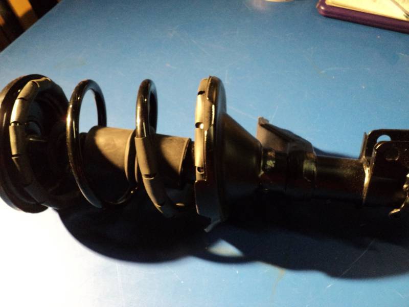 lot 4613 image: Automotive Spring Strut 129412 09200810 01180420