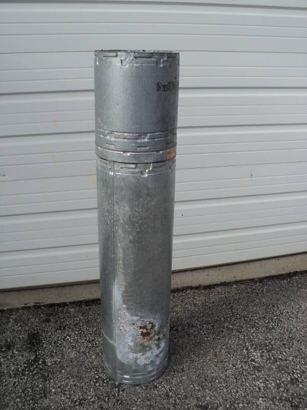 lot 4622 image: Metal Fab Chimney Residential Type A, 8A, 2 pieces (1) 36 x 8 diameter, (1) 13 x 8 diameter