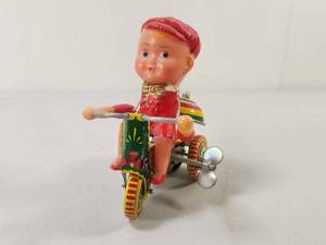 lot 102 image: Wind-Up Tin Toy Tricycle with Doll Figure Made in China Model 261 PS013