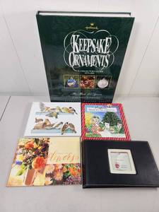 lot 169 image: Hallmark Keepsake Ornaments Collectors Guide 1973-1993 with Books and Materials