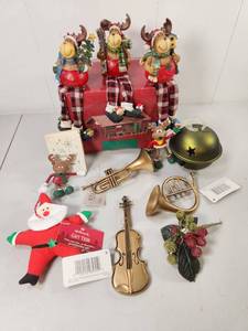 lot 170 image: Hallmark Holiday Ornament Collection Sarah Plain Tall Barn Reindeer Musical Instruments