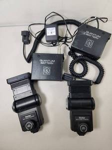 lot 178 image: Vivitar 285HV Zoom Thyristor Flash 2-Pack with Quantum Battery Pack System