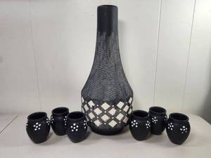 lot 184 image: Tall Black Vase With Mini Mexican Pottery