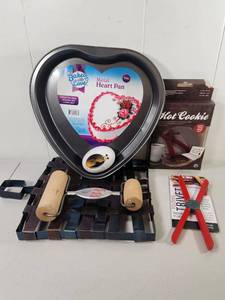 lot 189 image: Baked with Love 9 in Metal Heart Pan with Pastry Roller, Cup Warmer, Trivet Bundle