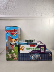 lot 208 image: Childrens Game Lot Doggie Doo, Yeti in My Spaghetti, Snowball Fight, Holiday Monster Memory Match, Mathematics Match It