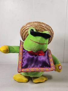 lot 212 image: El Froggo Singing Frog Plush