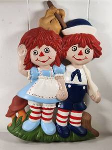 lot 214 image: Raggedy Ann and Andy Ceramic Wall Art