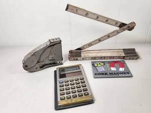 lot 223 image: Lot of  Vintage Tools Tape Measure, Calculator, Stapler, Magnet