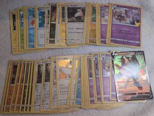 lot 1117 image: Pokmon TCG BASIC Lot Multiple Cards Including Snorlax Lugia Cosmoem Zamazenta - 60 ct