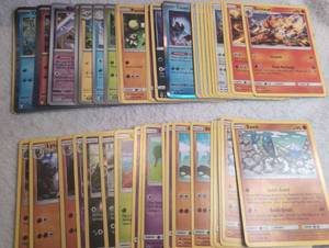 lot 1121 image: Pokemon Trading Card Game Lot Basic Energy Trainer Sawk Simisear Chien-Passin Lycanroc - 60 ct