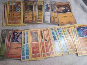 lot 1123 image: Pokmon Trading Card Game Collection Lot Basic Energy Trainer Pokmon Cards - 80 ct