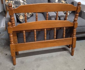 lot 42 image: Twin Size Vintage Solid Wood Headboard and Footboard with Spindle Posts (no side railsframe). Screw style frame attachment.  Some light finish wear