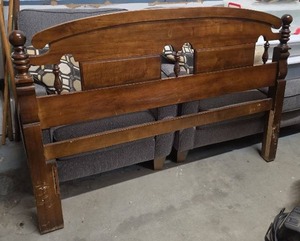 lot 43 image: Wooden Queen Headboard with Turned Posts - some light finish wear.  Missing extra board on one side that has slat for a full size, so only queen with holes for screw frame attachment