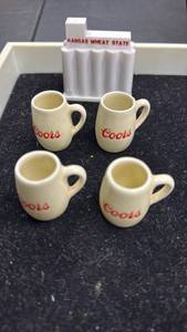 lot 109 image: Coors Beer miniature ceramic Mugs Set of 4 (shadow box size) and a Kansas Wheat State Building Trinket filled with wheat seeds