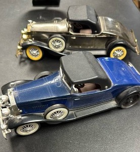 lot 114 image: Classic Roadster Style Toy Car Model with Speakers Lot of 2 - untested for sound, uses batteries