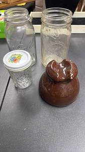lot 118 image: Ball Perfect Mason Glass Canning Jars (qty 2), a Jelly Jar and a Brown Ceramic electrical insulator.