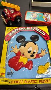 lot 140 image: Disney Mickey Mouse 3D Puzzle, Plastic with Fire Truck Toy and Vintage Mickey and Mini Tin Box